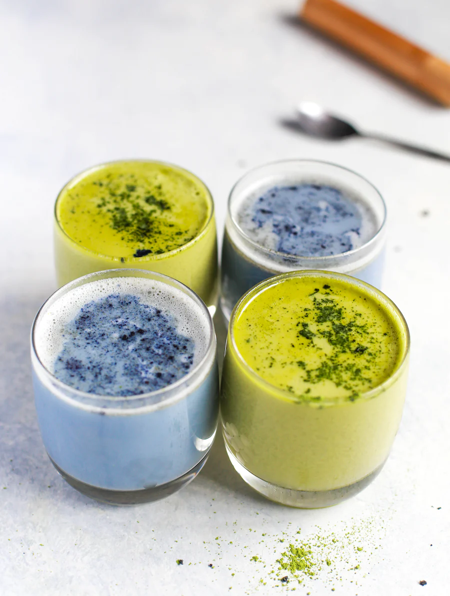 two blue teas and two matchas in white cups